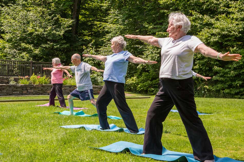 4 people doing yoga